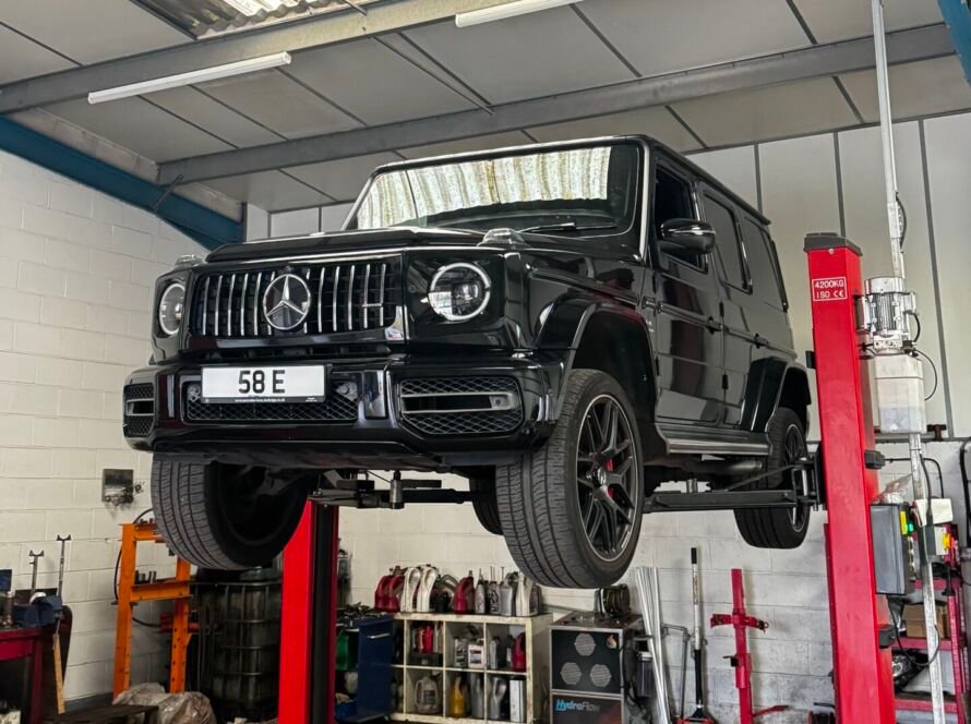 G Wagon being repaired on our car ramp at TuneX